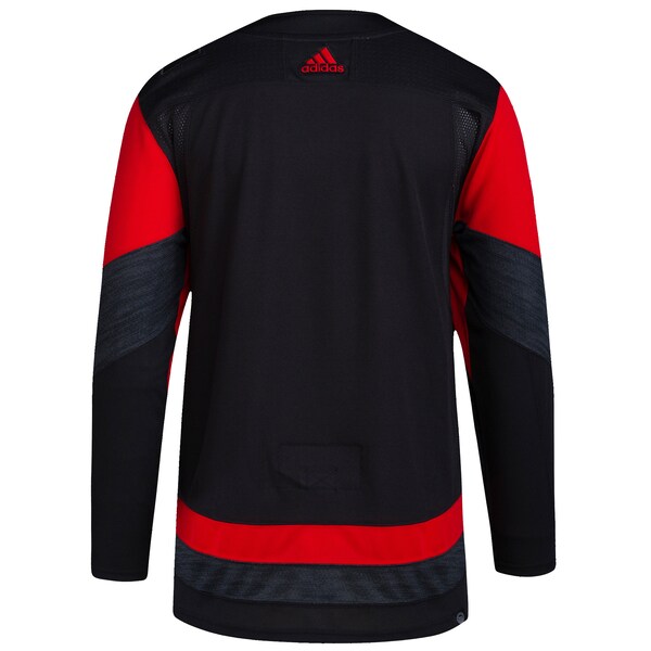 Carolina Hurricanes adidas 2023 NHL Stadium Series Primegreen Authentic Jersey - Black - Image 3